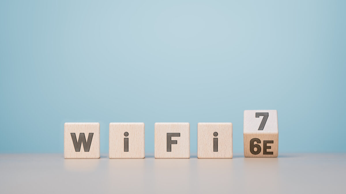 Wooden cube blocks flipping from words WiFi 6e to WiFi 7.